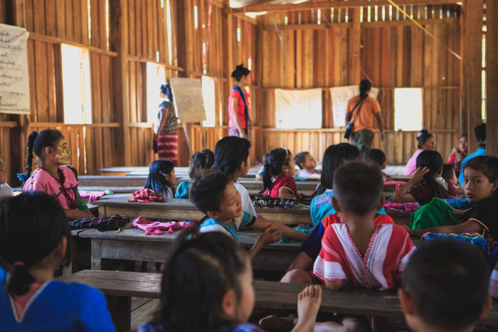 Pupils at their desk in the classroom in Myanmar
